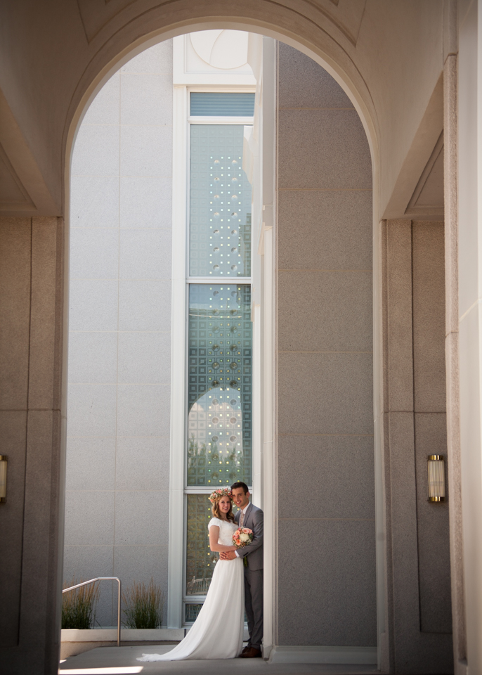 Bride and Groom under arch